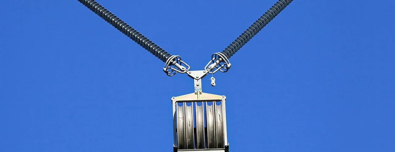 Insulator string and conductors on a tower
